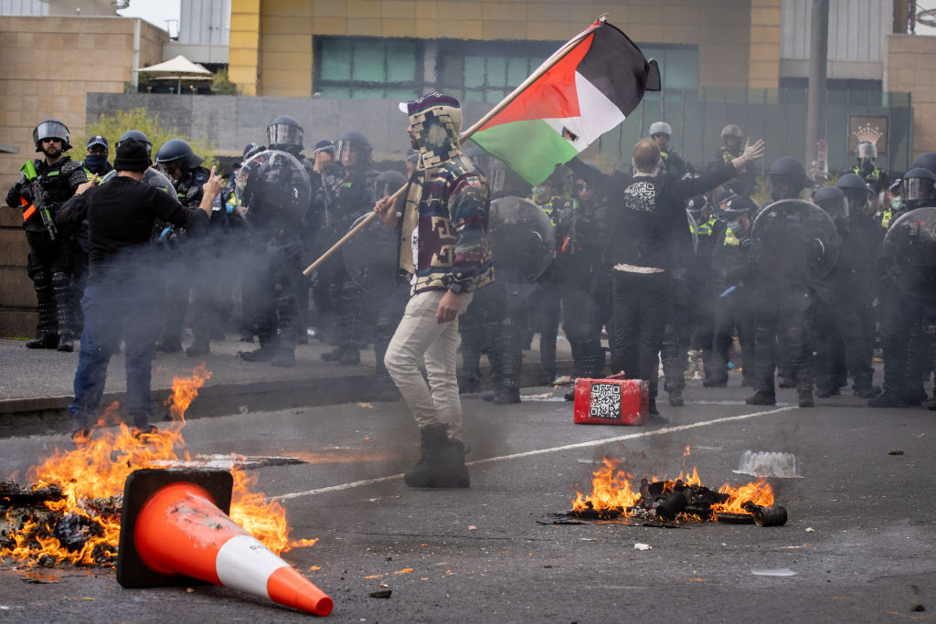 Anti-war protesters are vowing to defy police and rally again outside a Melbourne weapons expo....