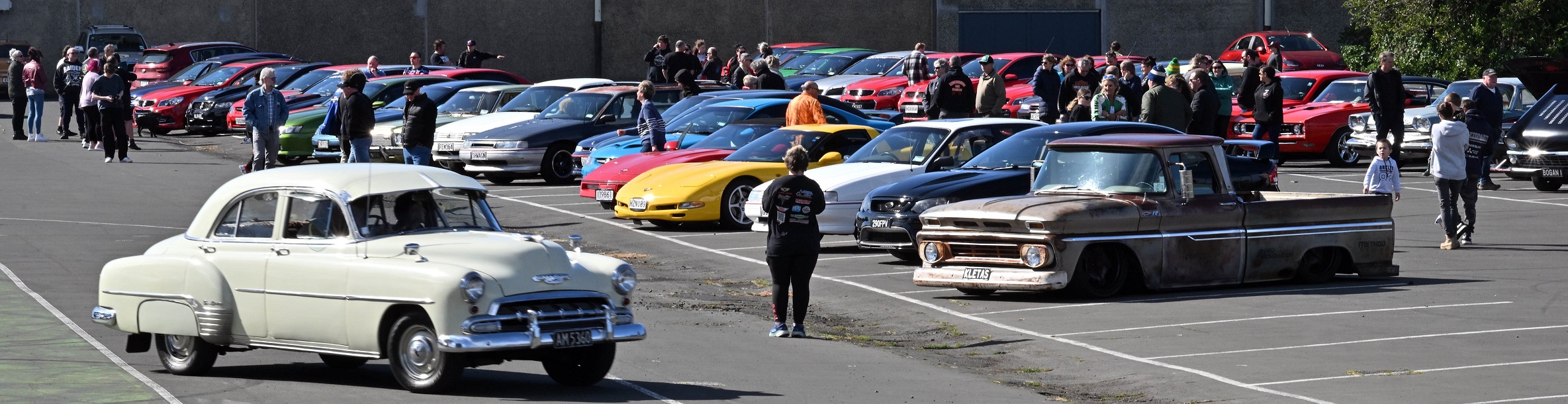 Drivers gather outside the Dunedin Ice Stadium before setting off on a hour-long cruise.