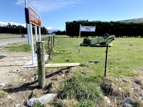 Steve Richards put this damaged car in his paddock near the intersection to raise awareness of...