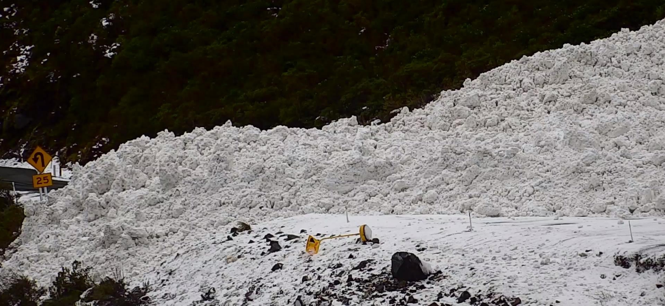 Avalanche debris near the west portal of the Homer Tunnel on Monday. PHOTO: MILFORD ROAD ALLIANCE 