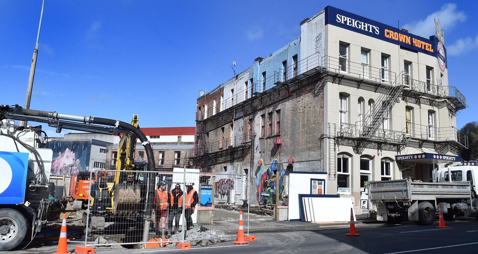 Contractors working on the empty section next door to the Crown Hotel in Rattray St. Photo: Peter...