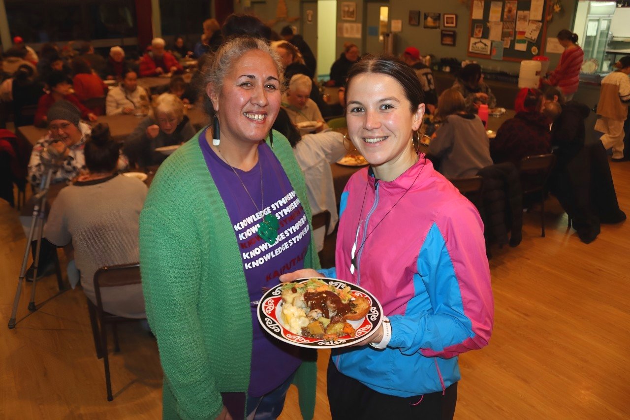 Food fundraiser . . . Gathering for a meal are Araiteuru Marae manager and Pātaka Ora host Tania...