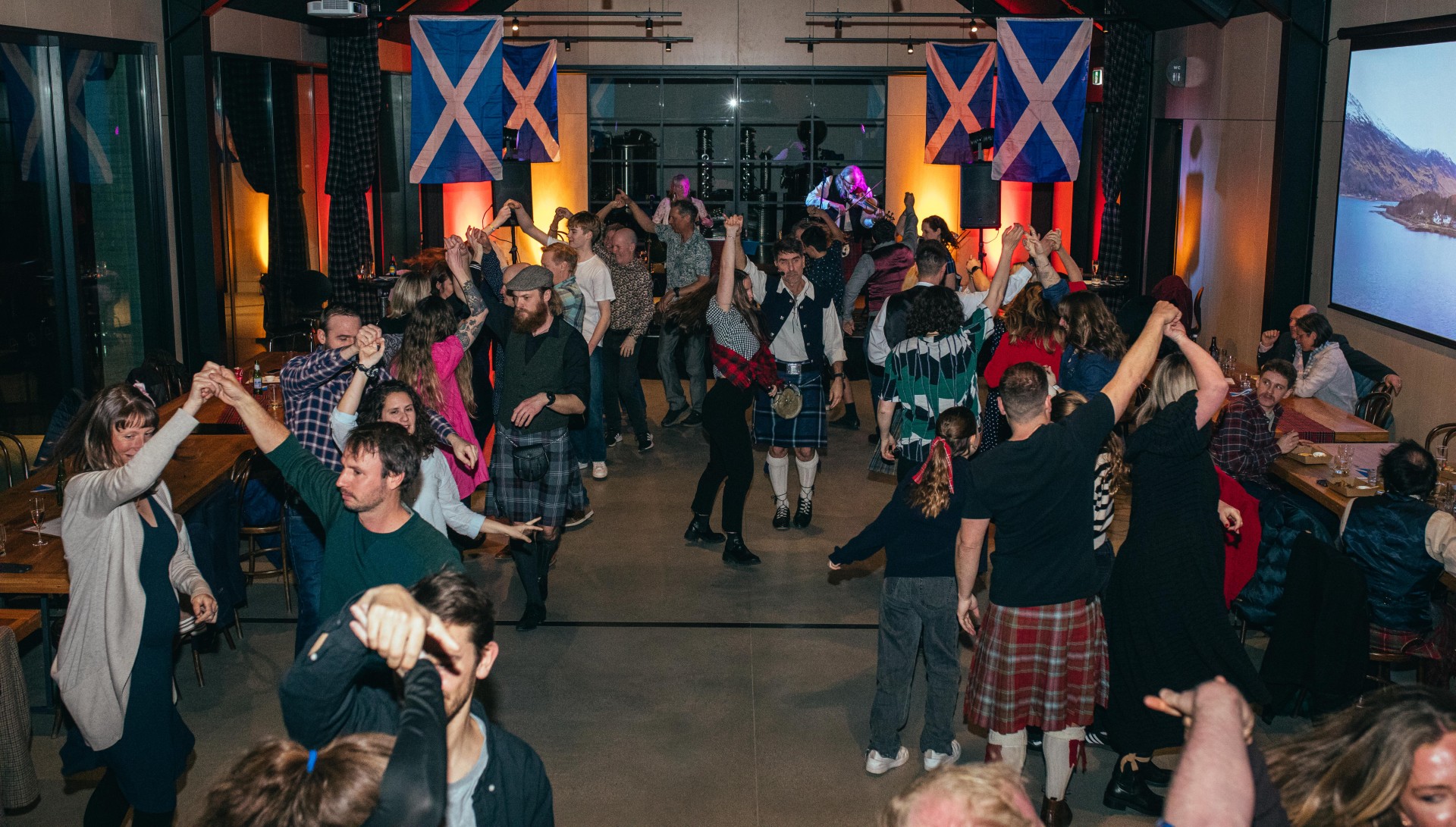 Take a partner... Revellers try out some traditional Scottish dancing during A Ceilidh Affair,...