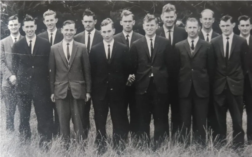 Bill Easton (back row, second from left, according to the original caption) with other members of...