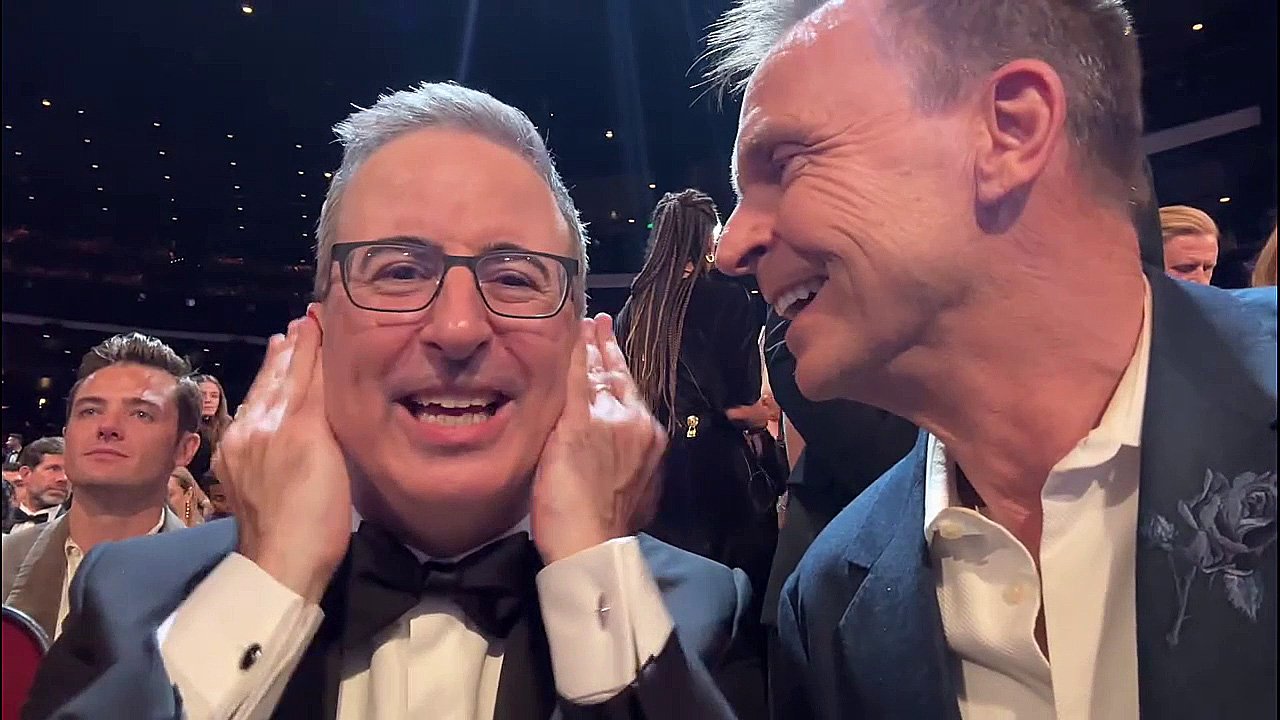 Last Week Tonight host John Oliver (left) and The Amazing Race host Phil Keoghan argue at the...