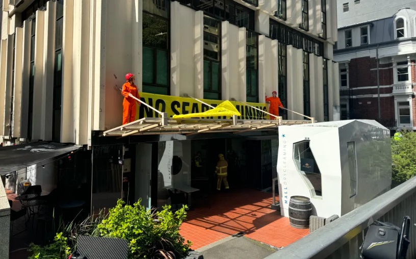 Protesters at the Wellington offices of the mining lobby group Straterra. Photo: RNZ 