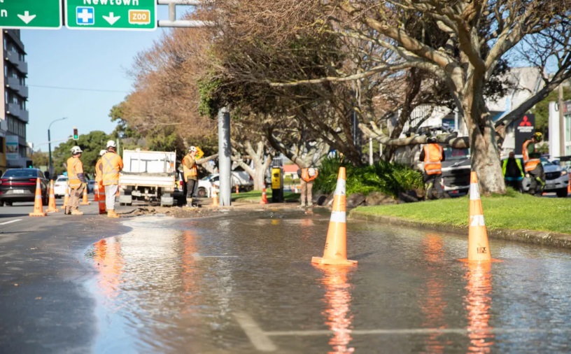 A burst water main floods a Wellington street last month. Photo: RNZ