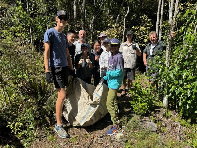 Rotary Club and OU Medical Students Association members collecting leaf litter for the new aviary...