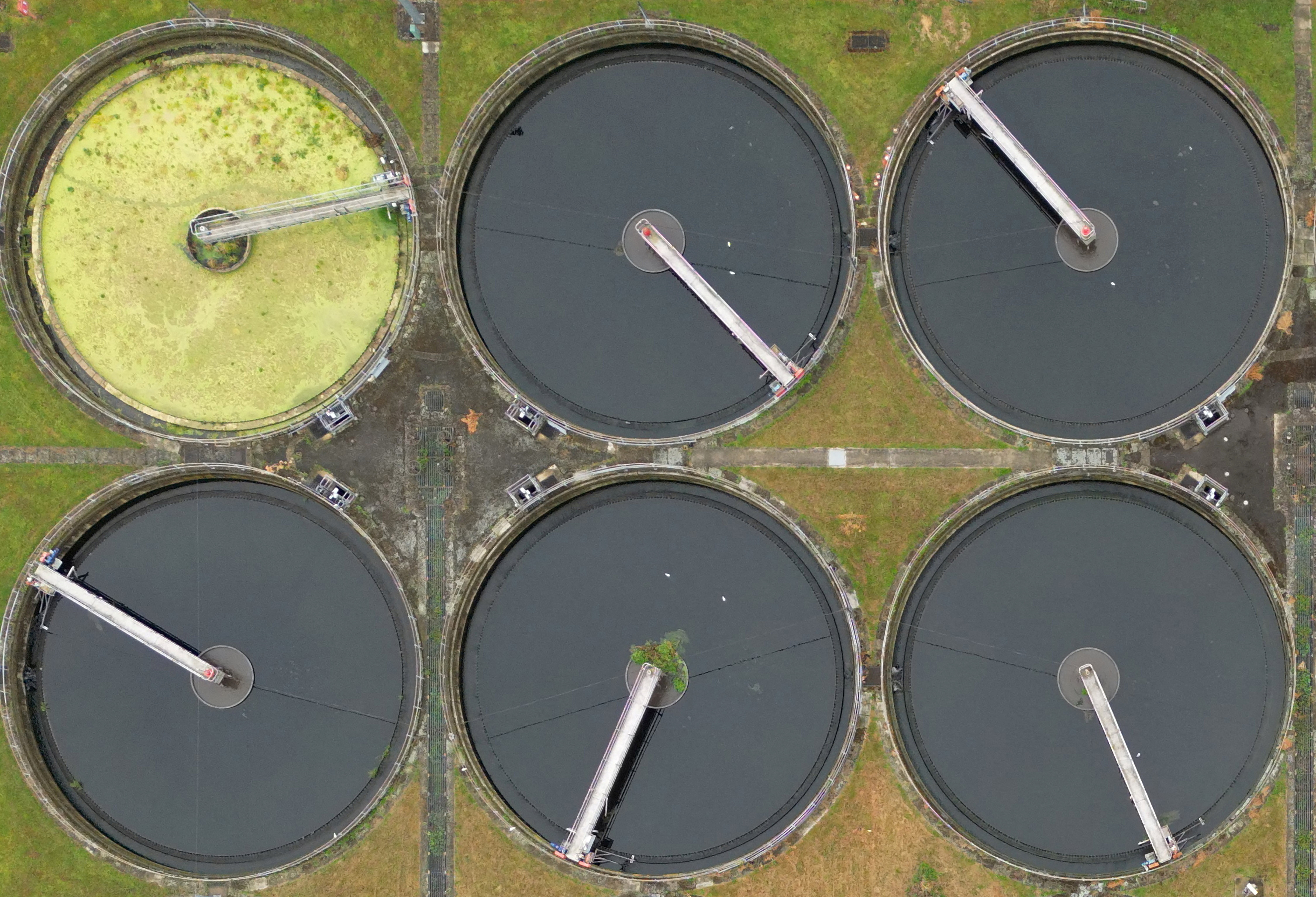 A drone view shows Mogden sewage treatment works, owned by Thames Water, in west London. Photo:...