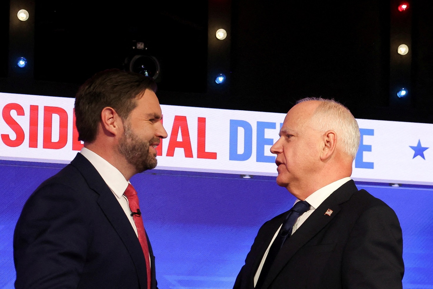 JD Vance (L) squares off against Tim Walz at the debate hosted by CBS in New York. Photo: Reuters