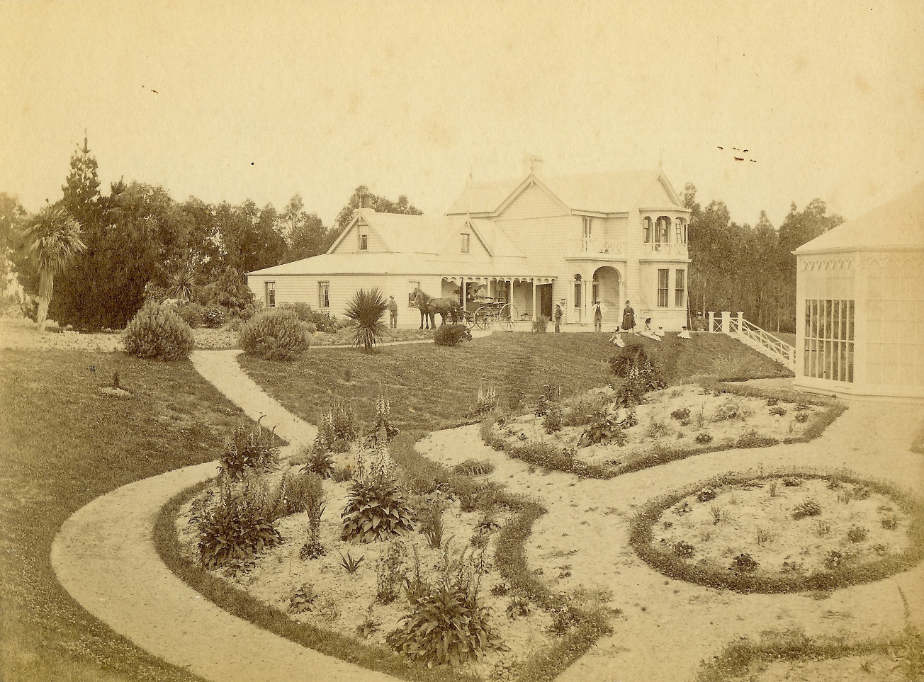 One of the photos stolen recently from Balclutha Museum, showing a Victorian house and garden in...