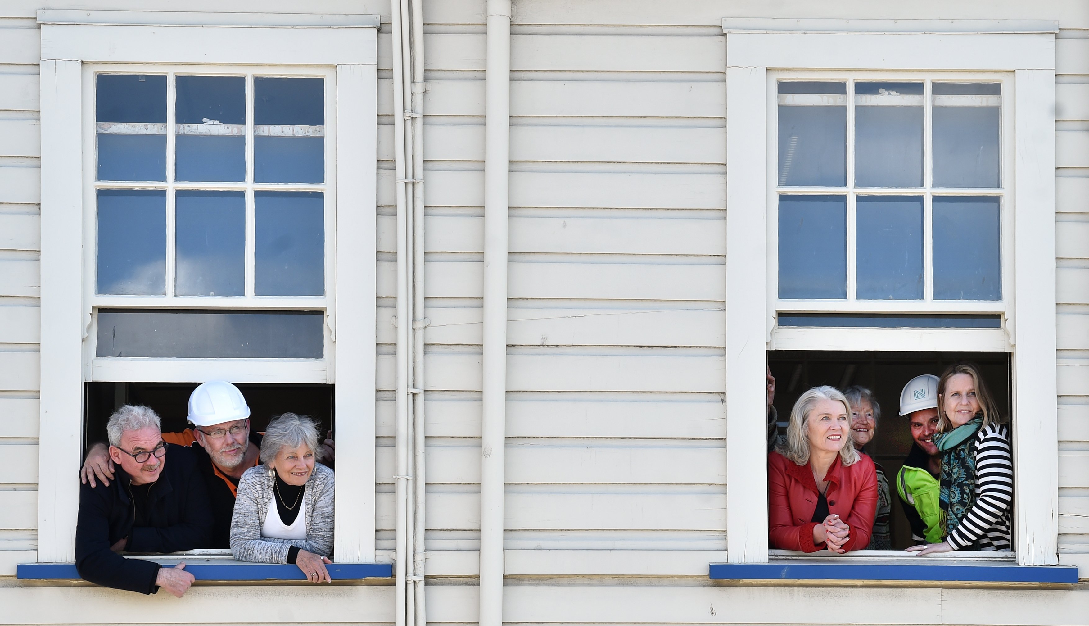 Gazing out from the former manager’s office at Hillside Workshops are (from left) architect Gary...