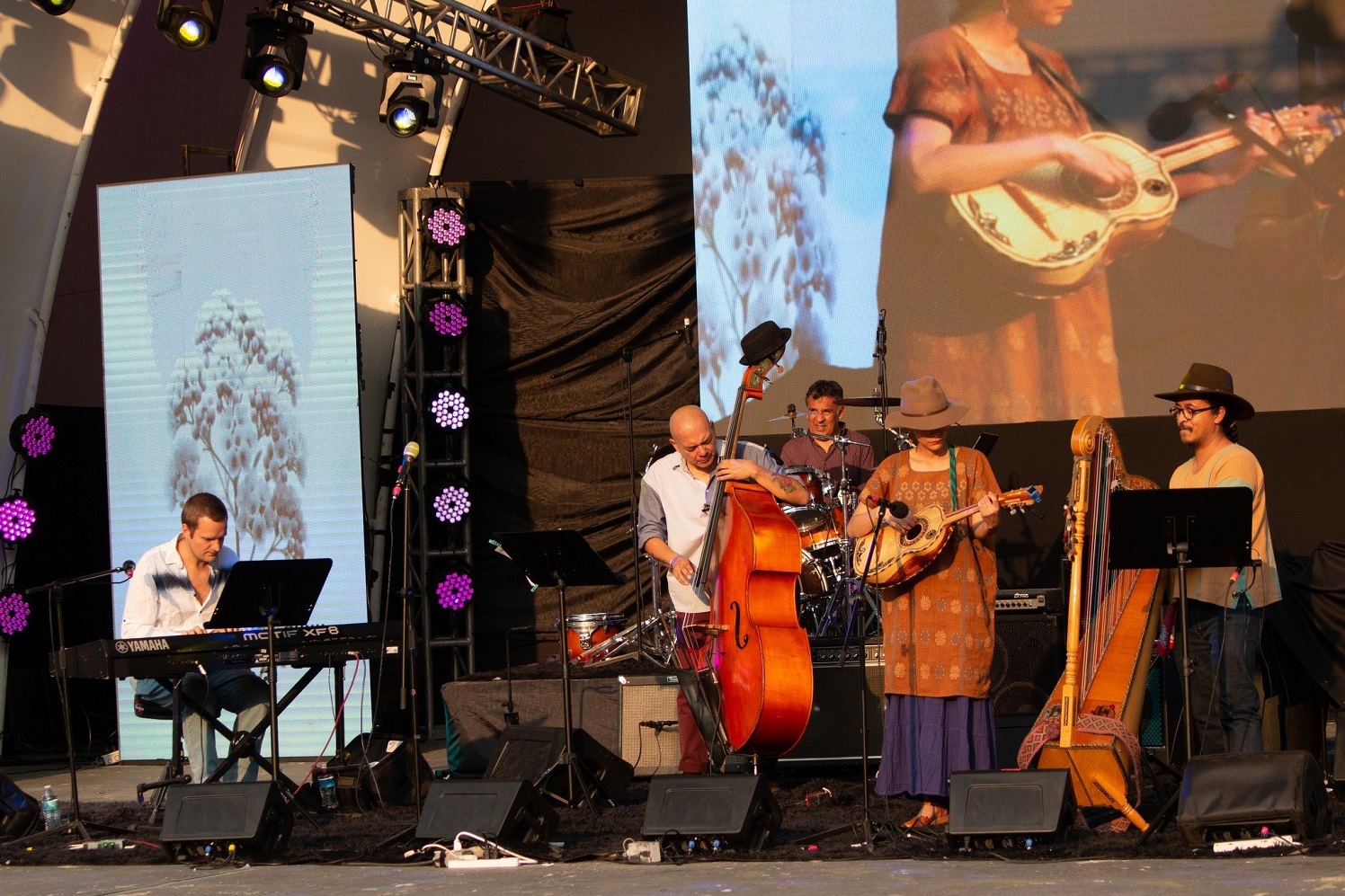 Dan Costa performs with indigenous Mexican musicians at a festival.