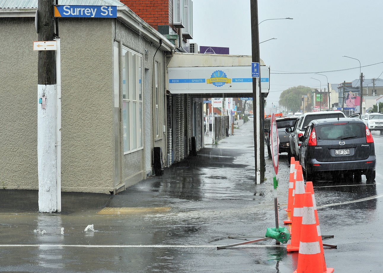 Flooding from Surrey St flows into Hillside Rd on Thursday, October 3. Photo: Linda Robertson