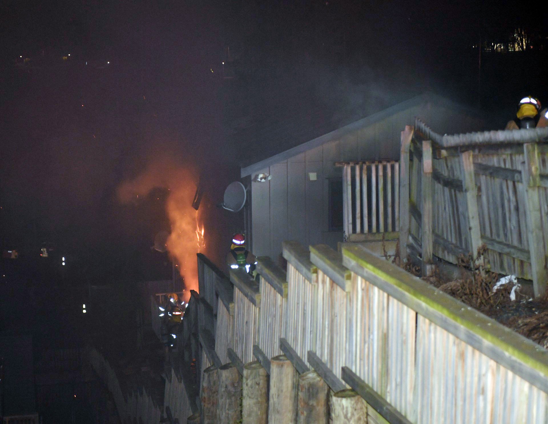 Firefighters work to control a fire at a property in Forth St, on Sunday evening. PHOTO: STEPHEN...