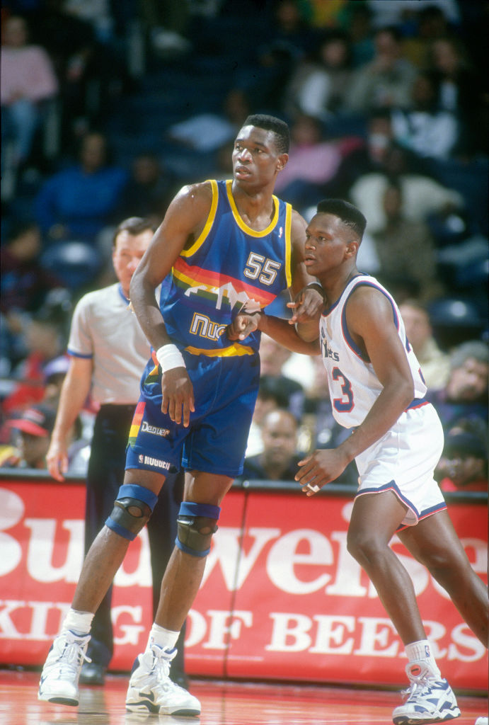 Dikembe Mutombo (left) playing for the Denver Nuggets about 1991. Photo: Focus on Sport/Getty Images