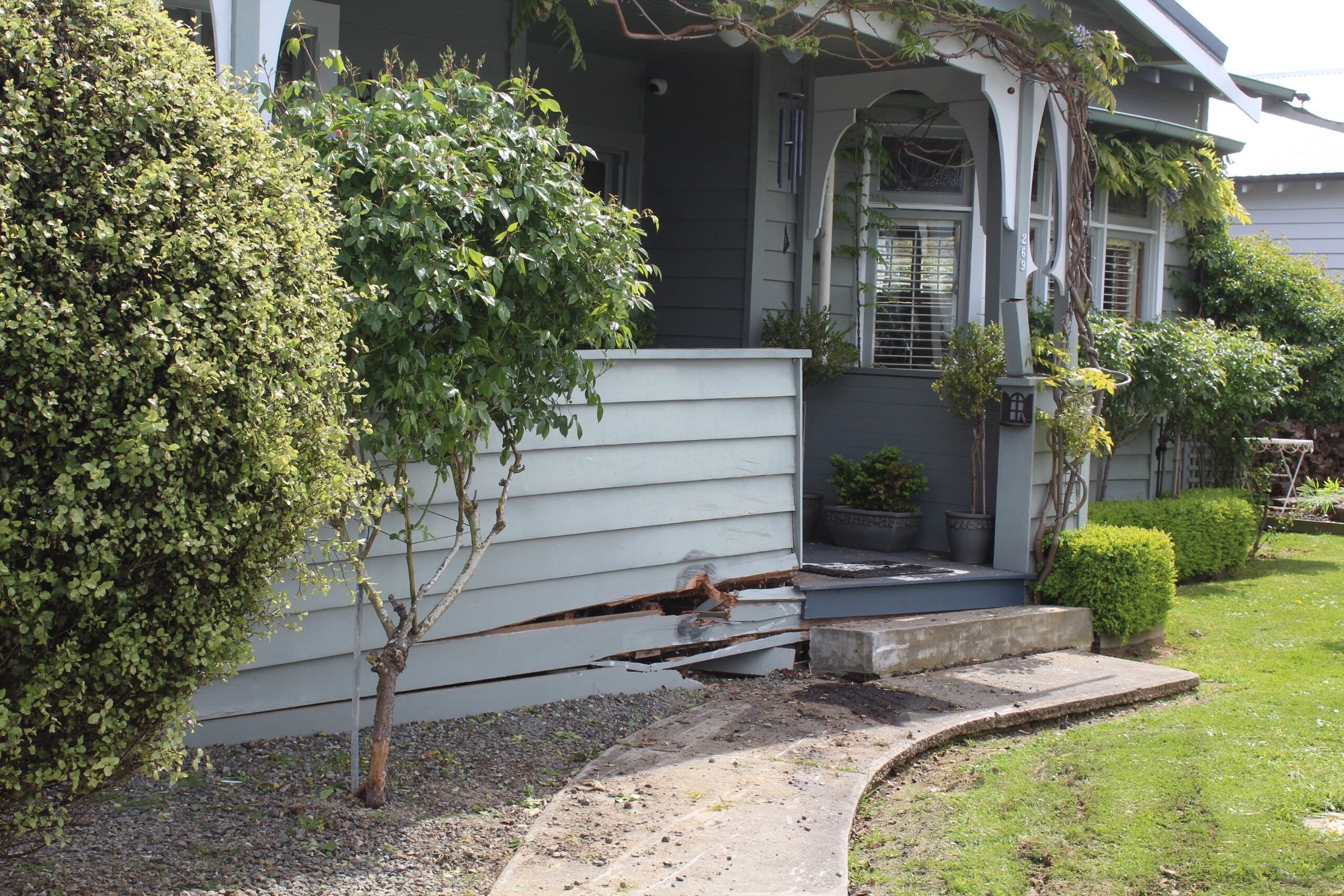 This house was damaged in the early-morning crash. Photo: Toni McDonald