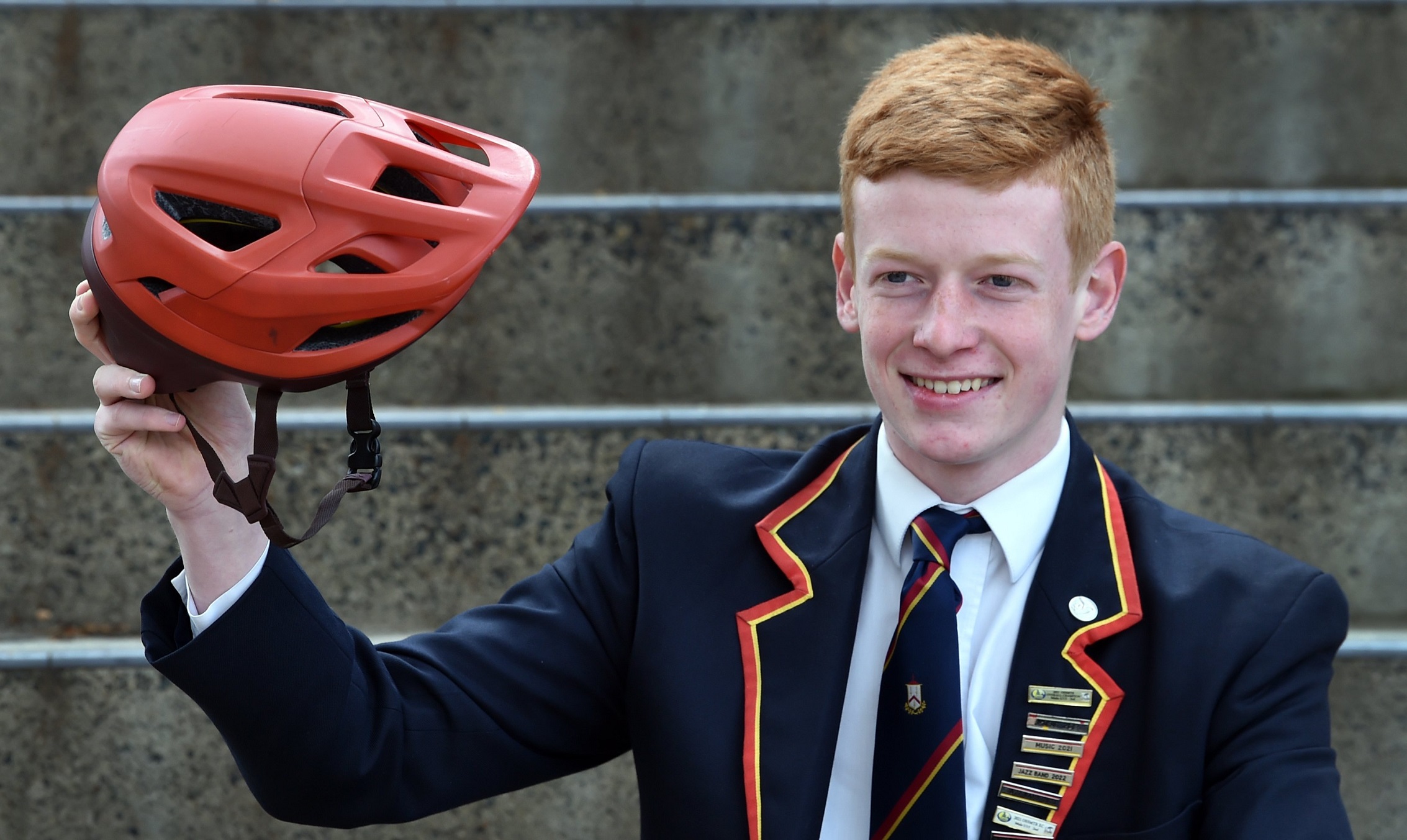 Cyclist Josh Grieve recovered from two painful crashes this year to win the road race and points...