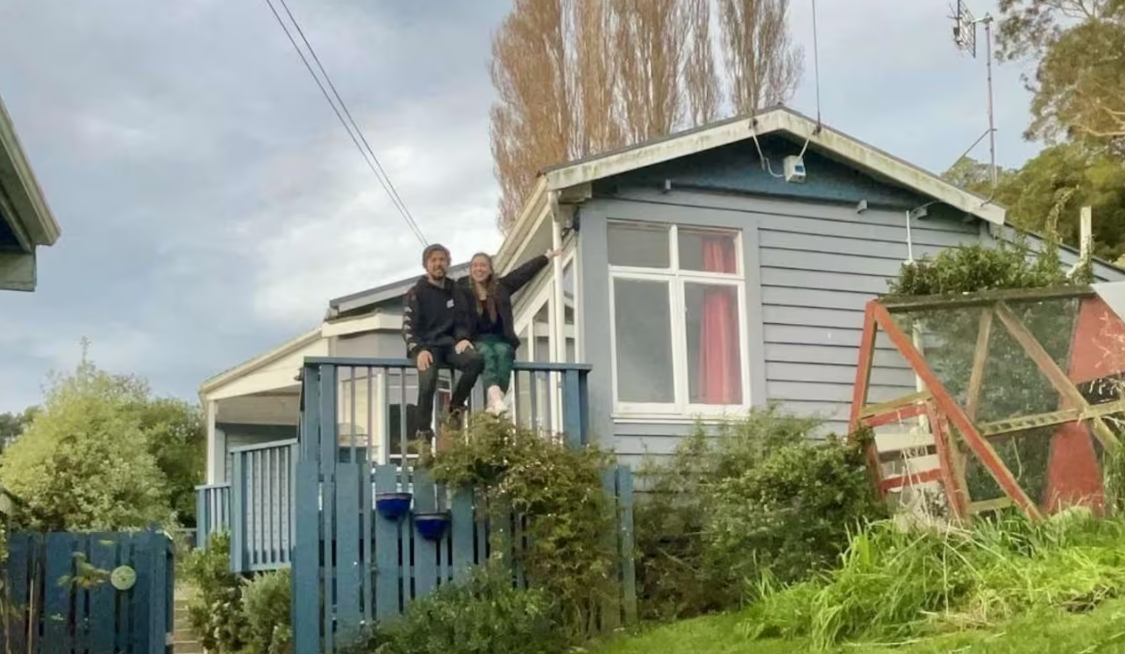 Stacey Kirby and his partner at the home they bought in April, and finally moved into four months...