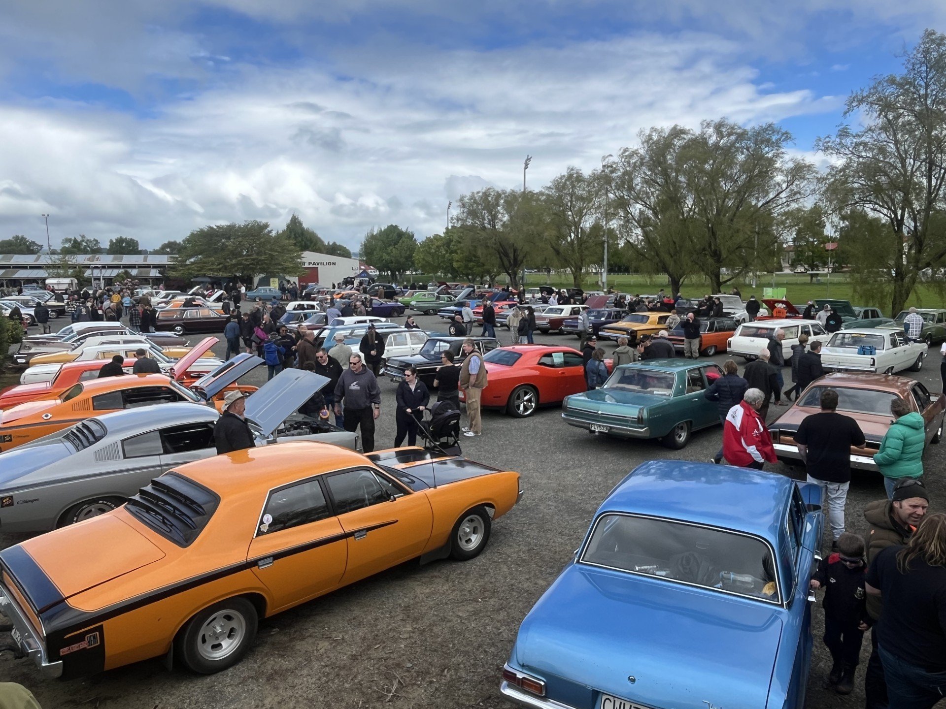 Enthusiasts admire the wide variety of classic cars on display at the Gore A & P Showgrounds...