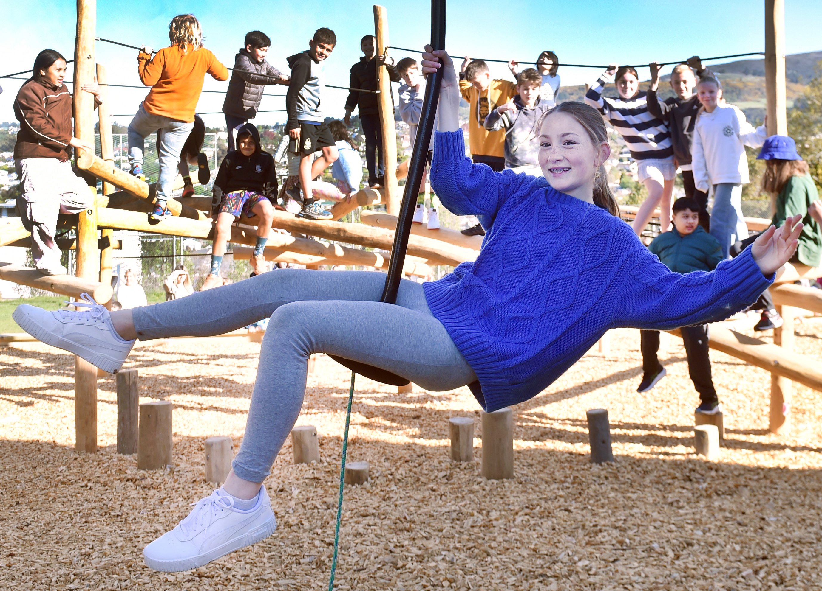 Kaikorai Primary School pupil Sylvie Fyfe, 11, tests the flying fox on the school's new...