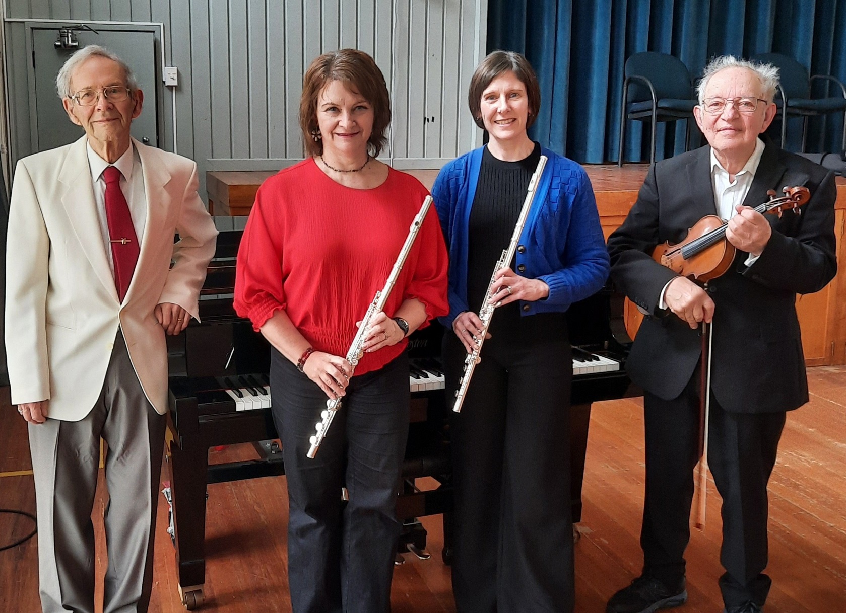 Preparing for a recital of French music for flute, piano, and violin this Sunday are (from left)...