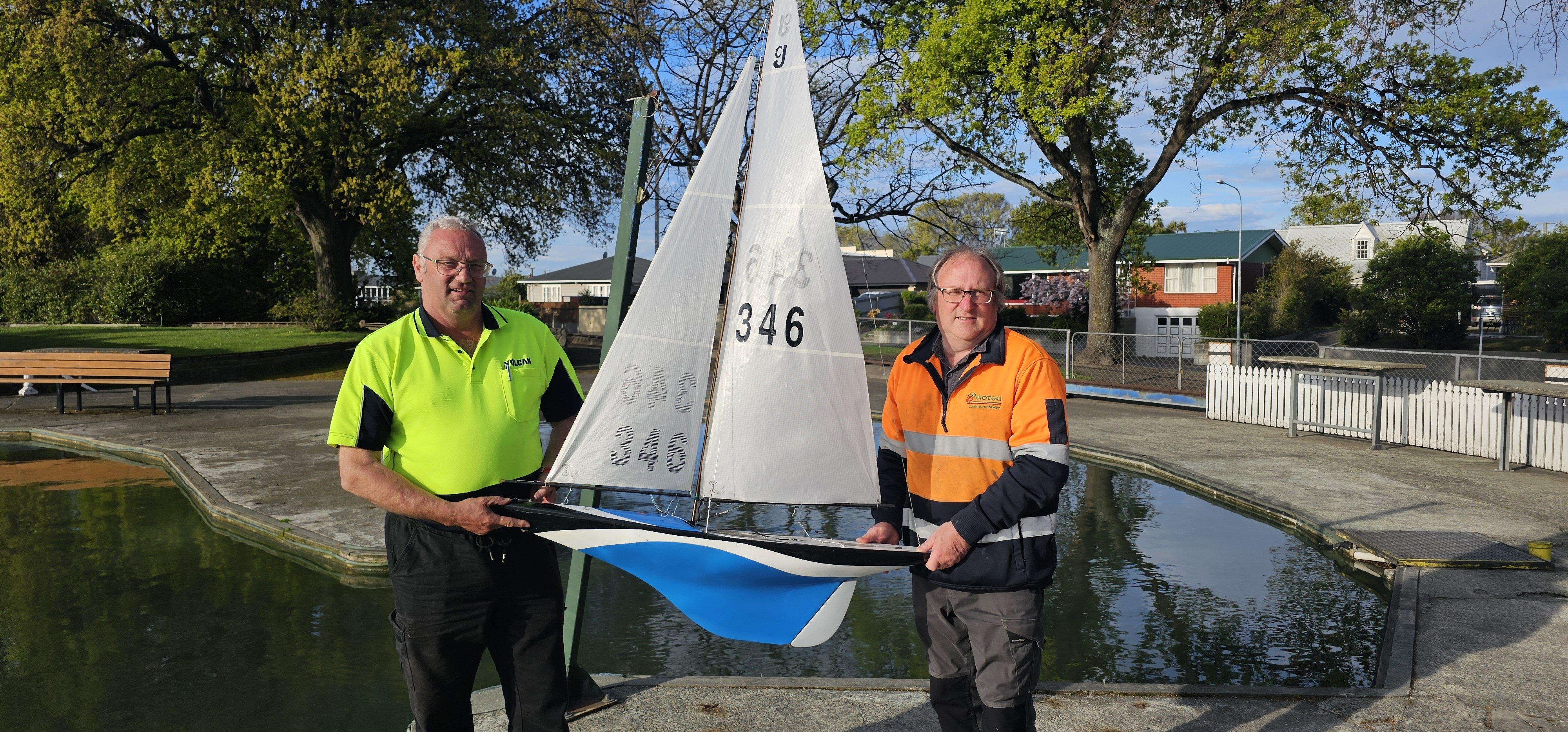 Showing off a Canterbury J Class boat are South Canterbury Model Engineering Club committee...