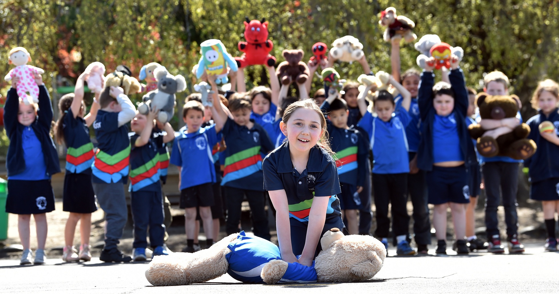 Carisbrook School pupil Octavia MacGillivray (7) shows off her newly-learnt CPR skills on her...