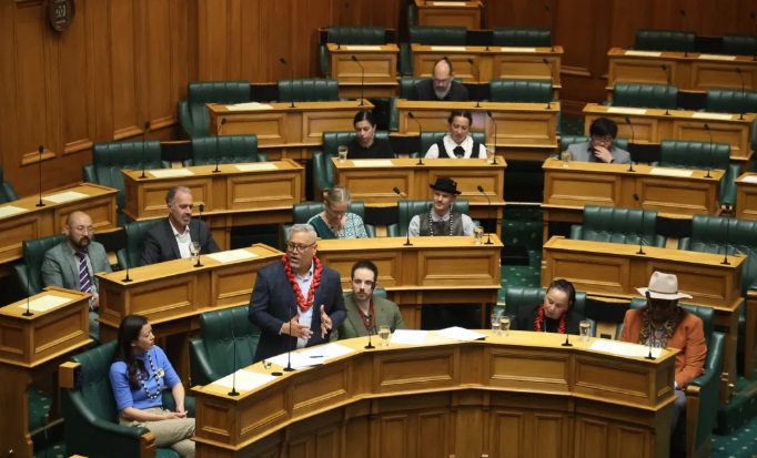 Green Party MP Teanau Tuiono addresses parliament during the third and final reading of his...