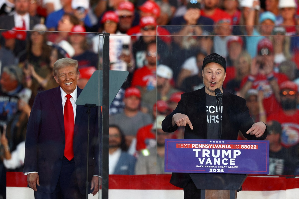 Donald Trump (L) and Elon Musk appear at a campaign rally in Butler, Pennsylvania last month....