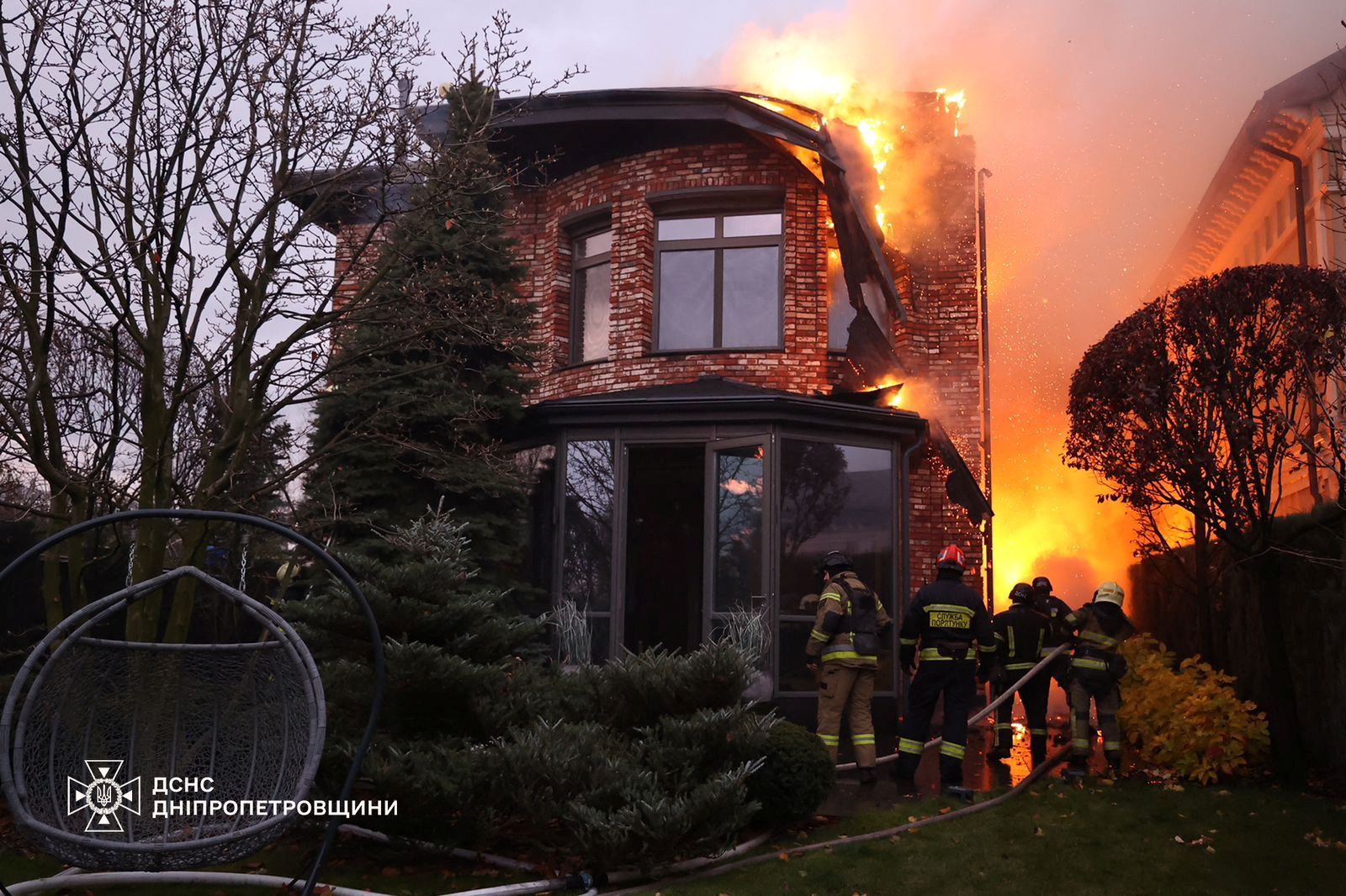 Firefighters douse flames at the site of a Russian missile strike in Dnipro. Photo: Press service...