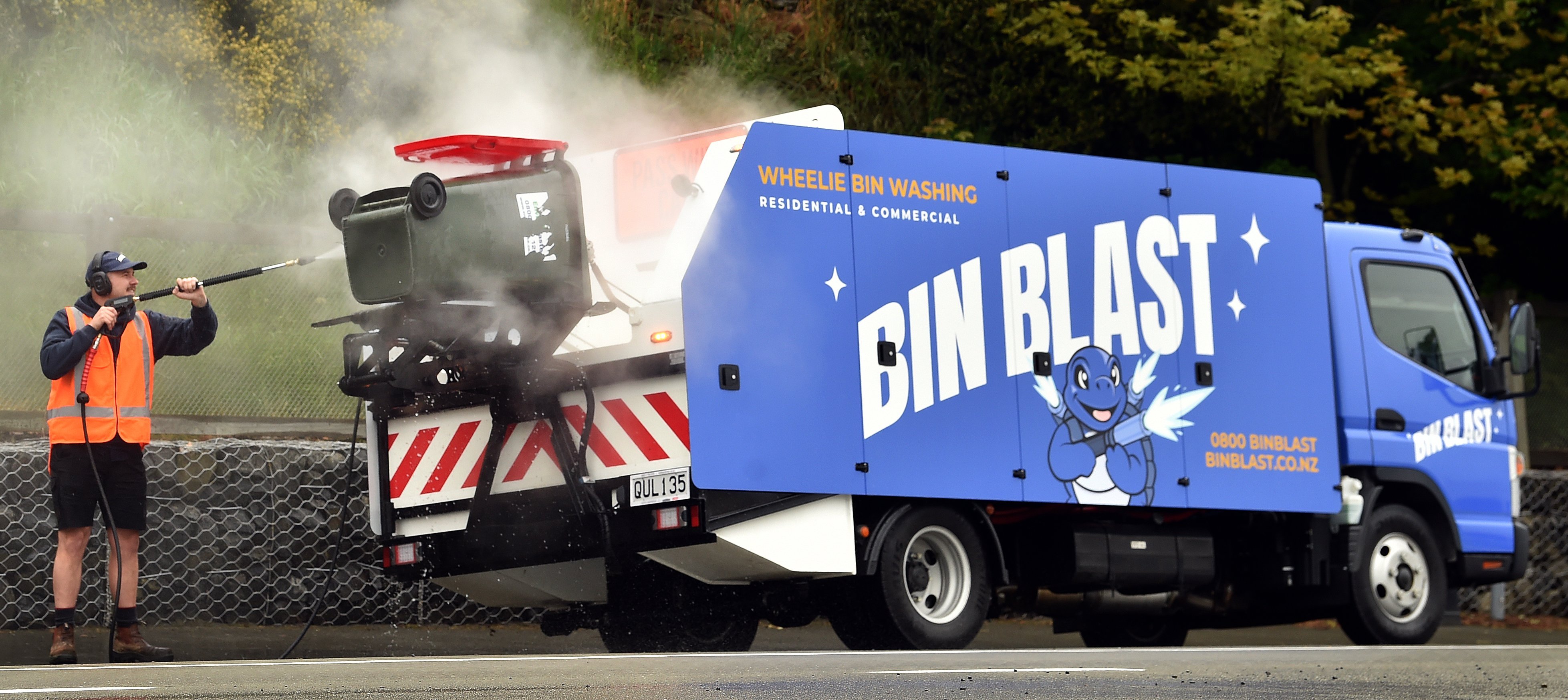 Blair Kippenberger demonstrates his new wheelie bin cleaning service which has launched in...