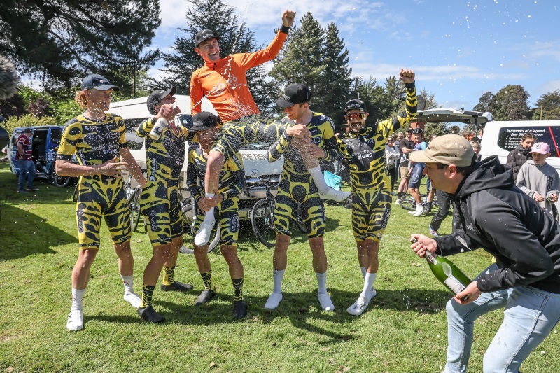 Just joshin’ around ... Josh Burnett is lifted by his team-mates after winning the Tour of...