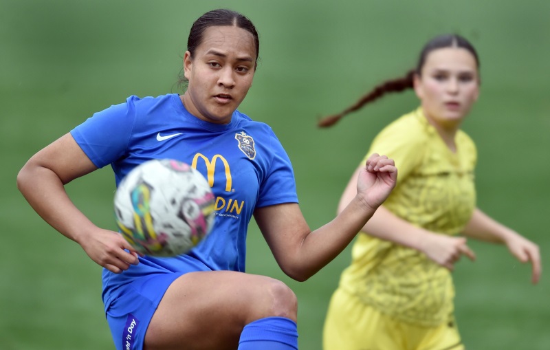 Eyes on the ball ... Southern United defender Alisa Tautagaloa moves the ball during their...