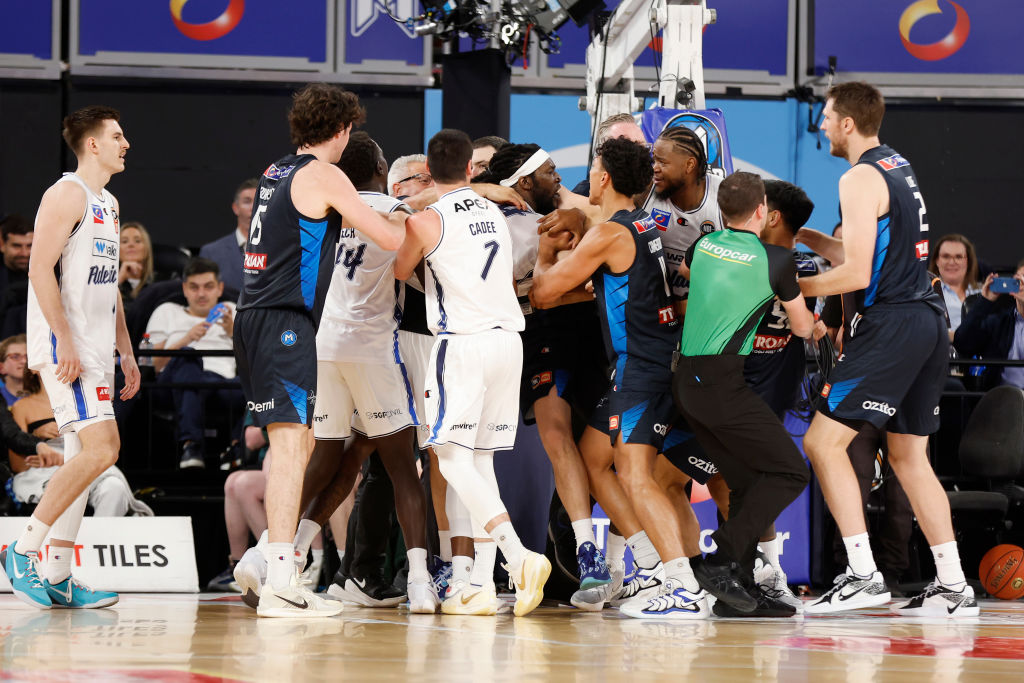 Two fans received bans for a courtside scuffle in the NBL game between Adelaide 36ers and...