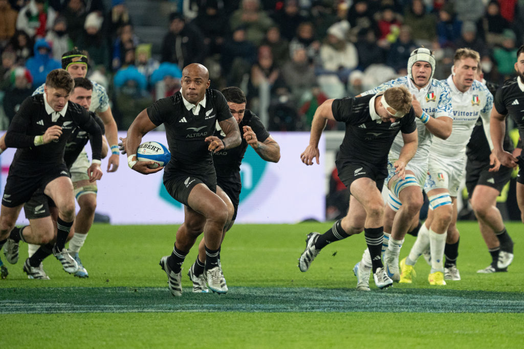 Mark Tele’a runs the ball up for the All Blacks against Italy. Photo: Getty Images