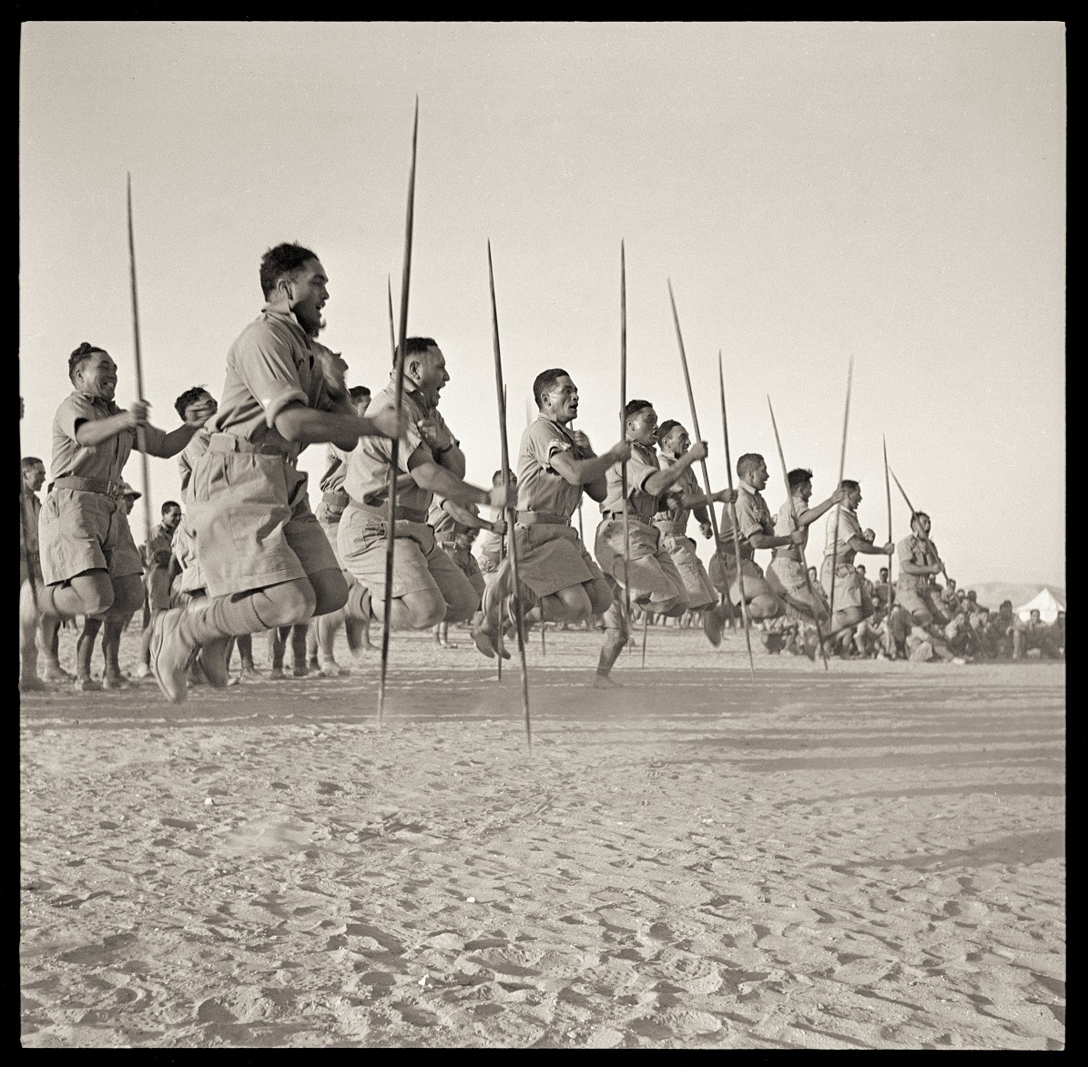 The Māori Battalion performs a haka for the exiled King of Greece, in Egypt, in 1941. Photo:...