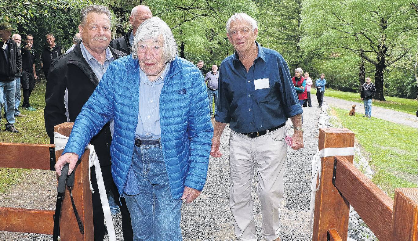 Jeanette Wells leads Robert Judson (right) and Neville Atkinson through the newly opened Ashley...