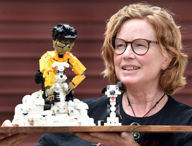 Kathy Richards with her entry, a scene from a working sheep farm, for the Tūhura Otago Museum...