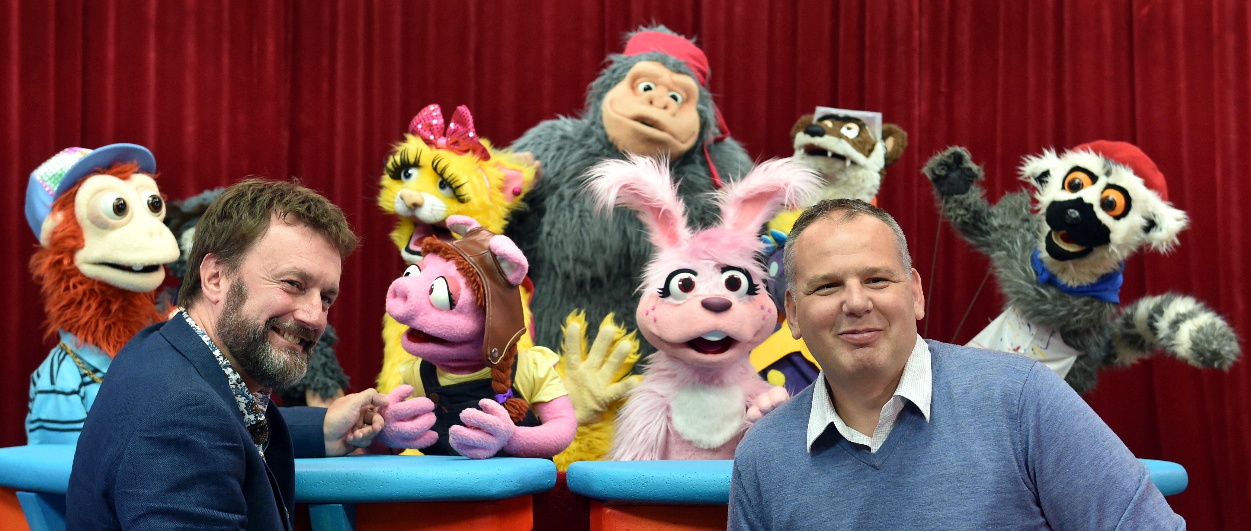 Surrounded by puppets at NHNZ’s Dunedin studio in 2016 are (above) ZooMoo creative director  Ian...