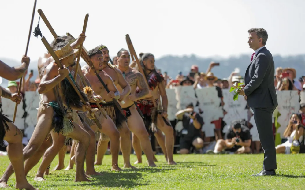 David Seymour is welcomed to the Treaty Grounds at Waitangi. Photo: RNZ 