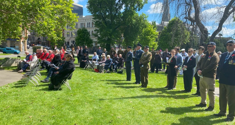 A section of the crowd of about 300 people who turned out in bright sunshine on Monday to honour...