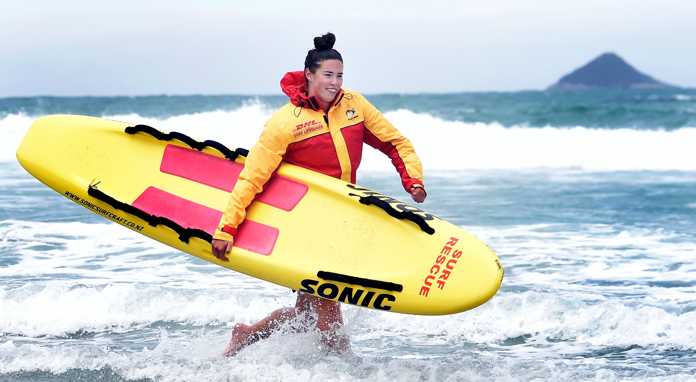 Charlotte Underwood-Nicol, pictured exiting the surf at Brighton Beach yesterday, will travel to...