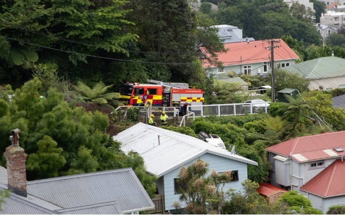 A large truck has flipped down a bank on Mortimer Terrace in Aro Valley. Photo: RNZ / Samuel...