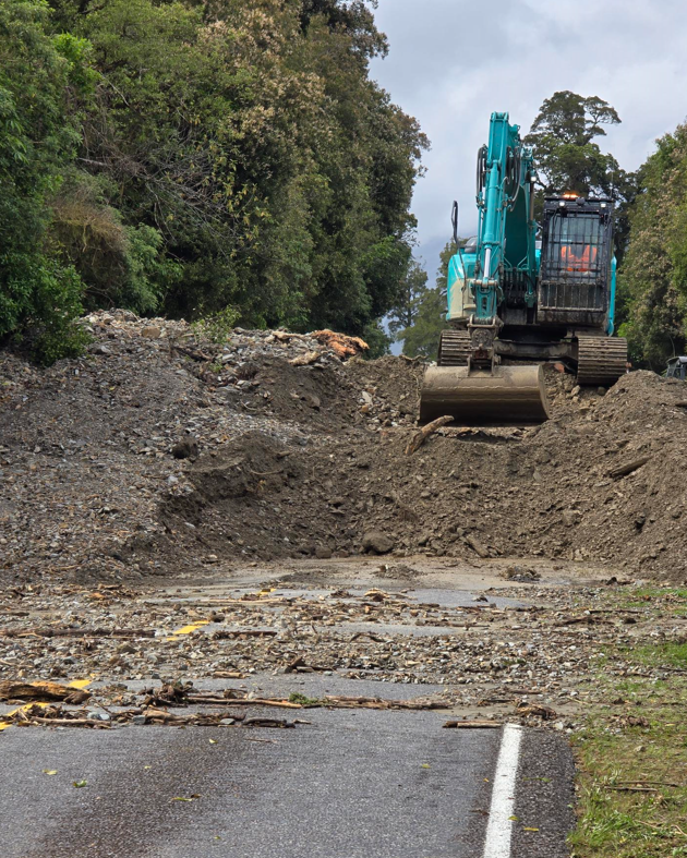 A track-level route north of Lake Moeraki was established on Sunday, enabling an escorted convoy...