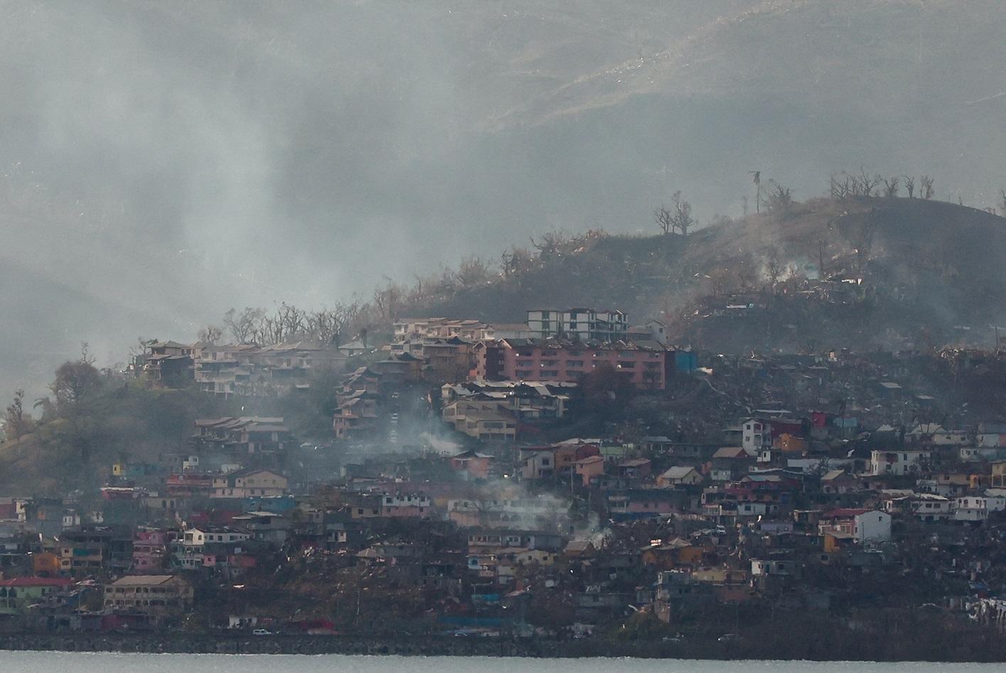 Smoke rises in Mamoudzou, Mayotte in the aftermath of Cyclone Chido. Photo: Reuters