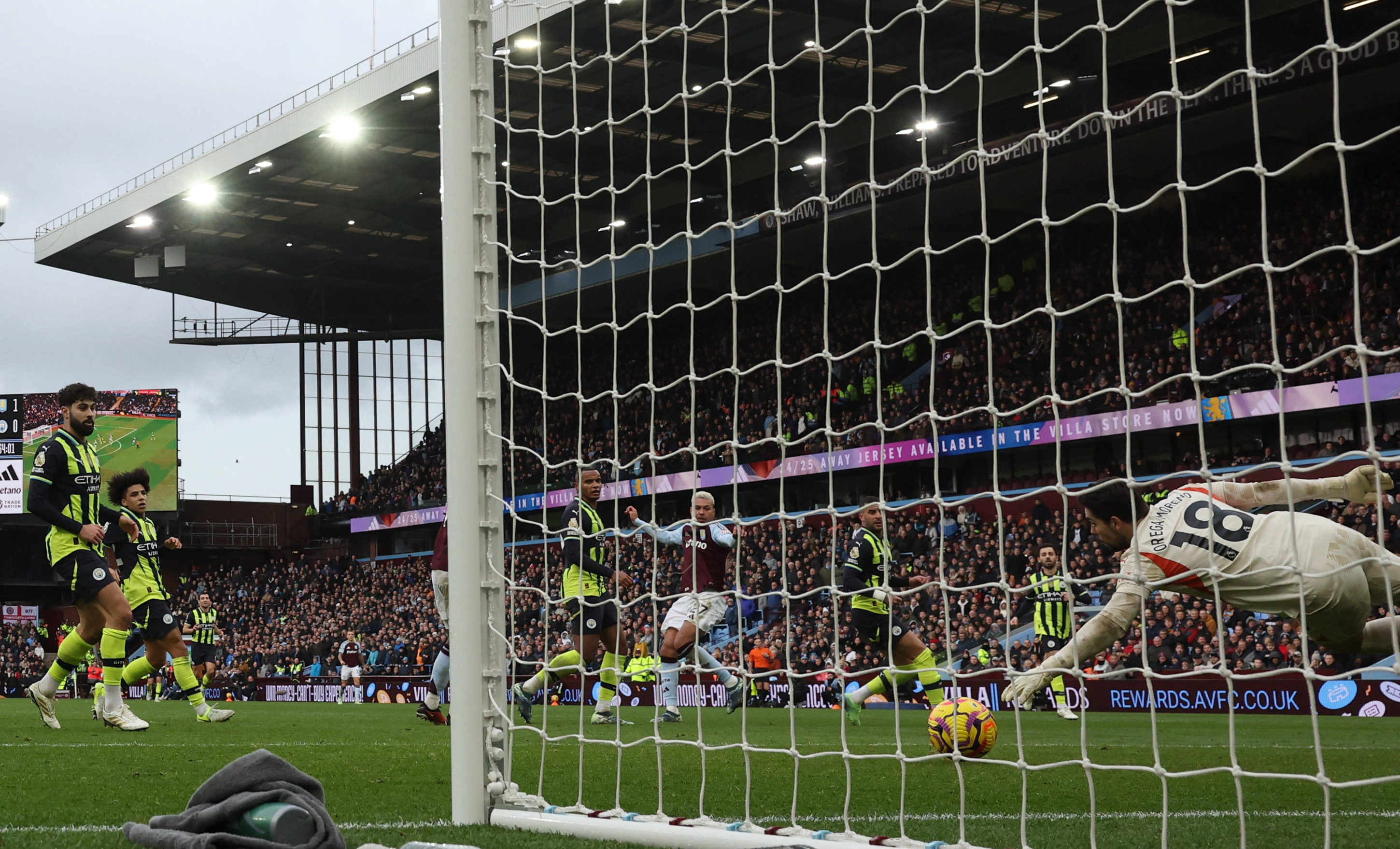 Morgan Rogers scores Aston Villa's second goal past Manchester City goalkeeper Stefan Ortega....