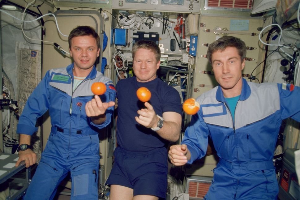 The Expedition One crew, the first to permanently inhabit the International Space Station, play...