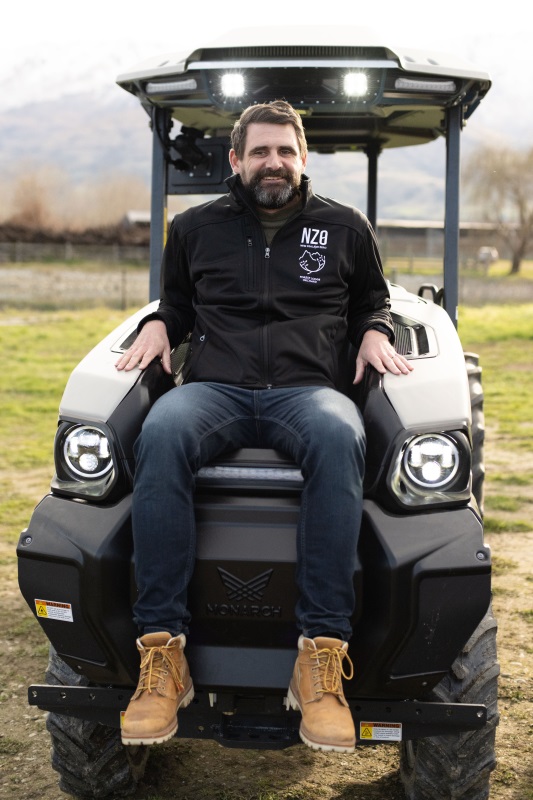 Mike Casey with the Californian MK-V Monarch tractor — New Zealand’s first driver-optional, fully...