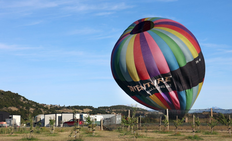 A balloon comes in for a hard landing at Queensberry yesterday morning. Inset: Passengers brace...